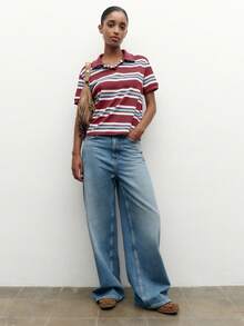 Nöista 这款短袖条纹 Polo 衫采用直筒宽松版型，展现出充满活力的复古风情，休闲百搭，易于搭配，是女士春假穿搭的理想之选；也适合日常穿着、都市出行、旅行，可与毛衣或风衣轻薄叠穿，轻松打造优雅的生日休闲造型。 - 酒紅色 - 查看 4