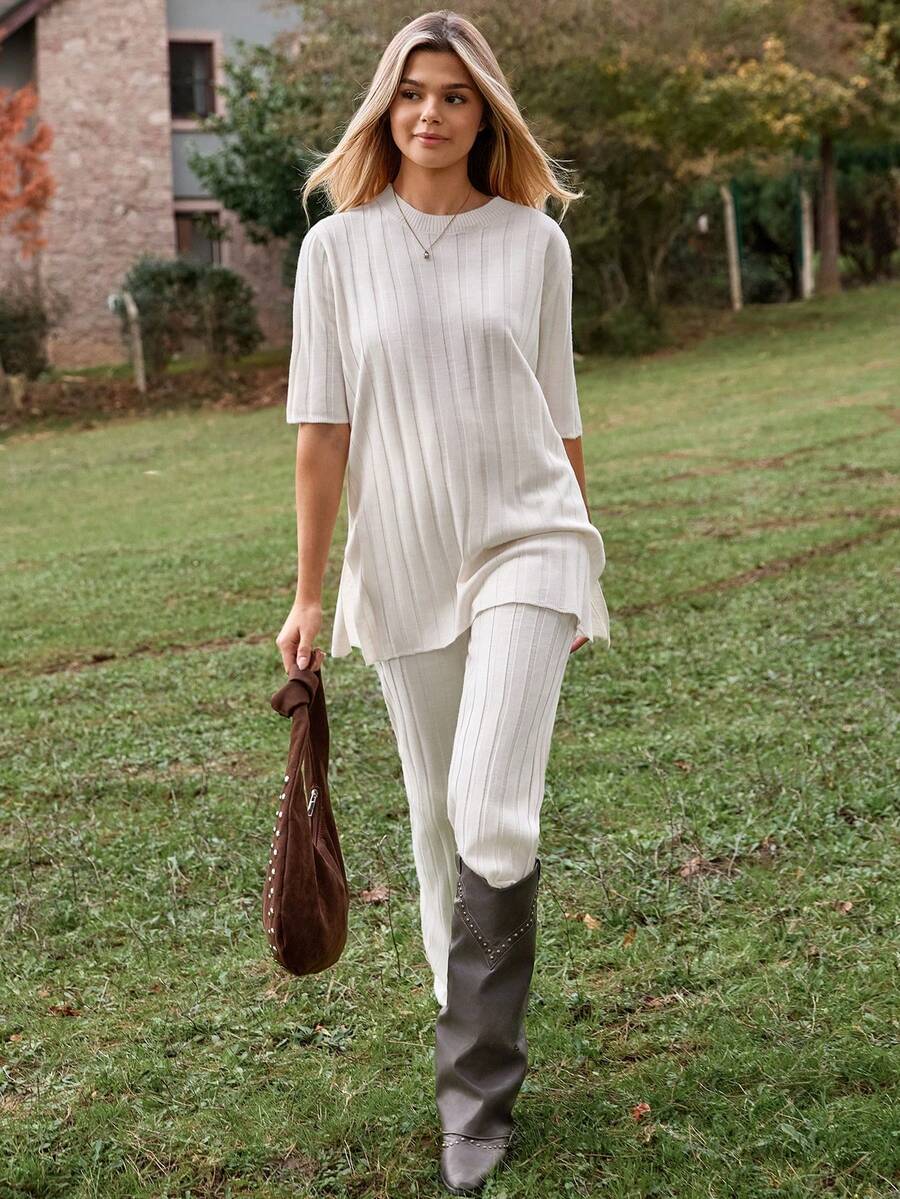 EURMUSE Two Pieces Ribbed Knit Set In Cream Featuring Short Sleeve Top With Waist Tie And Wide Leg Pants - White - View 1