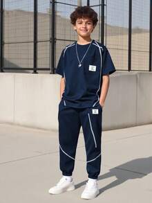 2pcs/Set Tween BoyCasual Simple White Striped Pocket Design Short Sleeve T-Shirt Paired With Knit Sports Jogger Pants, Spring/Summer Vacaura Outfit