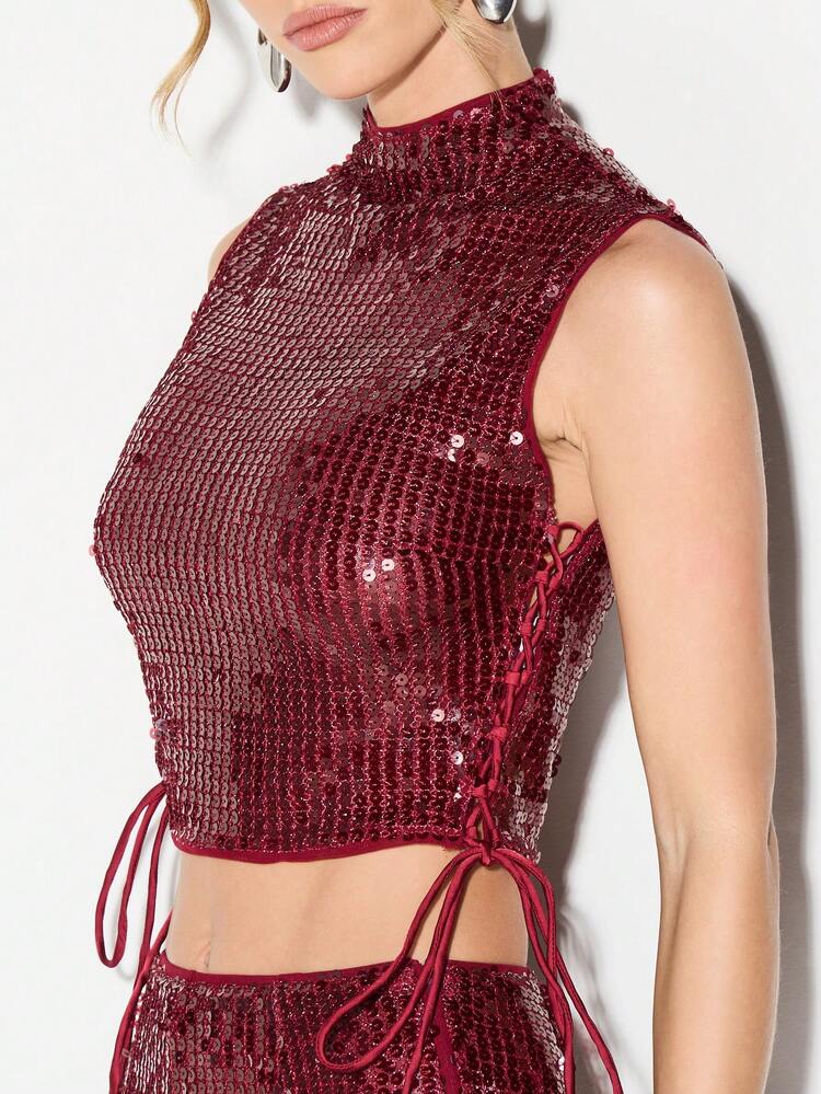 KIZN Top z wysokim kołnierzem i wiązaniem z cekinami