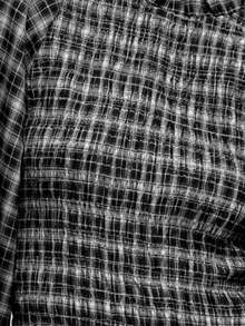 Nöista 两件套格子套装，包括一件长袖衬衫和一条带有荷叶边腰部的配套半身裙，打造优雅正式的廓形，非常适合女性春假穿搭、从办公室到晚宴的无缝过渡、派对的精致造型、生日聚会的女士服装叠穿搭配以及优雅的庆祝活动。 - 黑色 - 查看 6