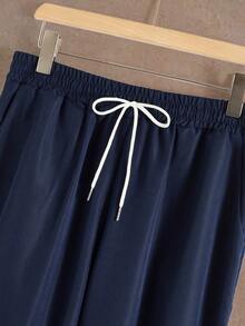 Manfinity Homme 男士字母印花条纹长袖衬衫和长裤休闲套装，蓝白配色，适合男士俱乐部、夜店等场合，男女皆宜。这款两件套休闲套装，风格经典，适合日常休闲、周末旅行、户外活动、探险旅行、轻松的工作环境或半正式场合，也是送给男友/丈夫、周年纪念/生日、派对、圣诞节、新年、婚礼等场合的理想之选。 - 彩色 - 查看 5