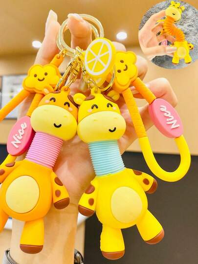 1个/2个/3个创意卡通长颈鹿钥匙扣，颈部可伸缩，可爱又解压的钥匙链，随机颜色包包挂饰，手机配件，女孩圣诞礼物必备。