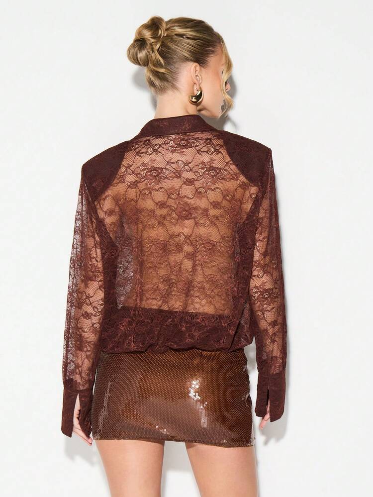 KIZN Spitzenbody mit tiefem Ausschnitt und Schulterpolstern