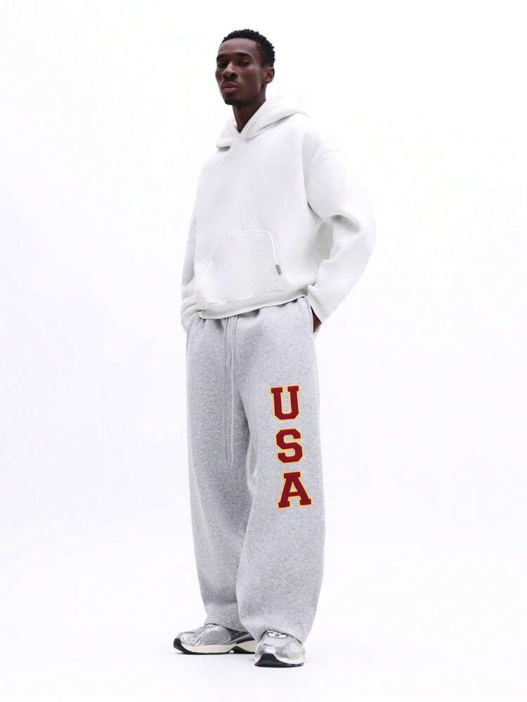 Spodnie dresowe z nadrukiem USA na nogawkach