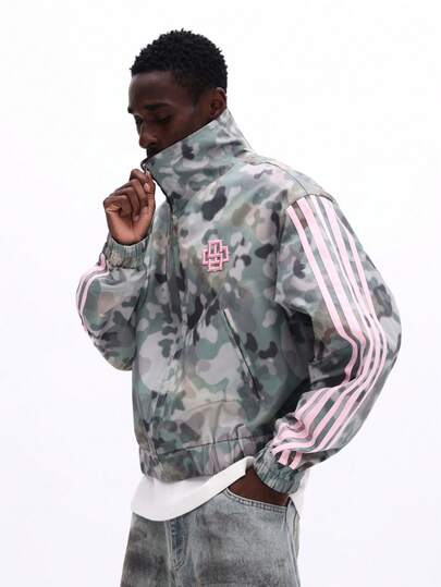 SUMWON Veste coupe-vent camouflage ajustée avec rayures roses sur les manches et col montant pour le port casual en extérieur