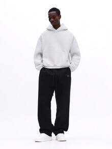 SUMWON Casual Drop Crotch Sweatpants With Embroidered Logo Detail And Relaxed Straight Fit For Everyday Comfort Plain - Black - View 1