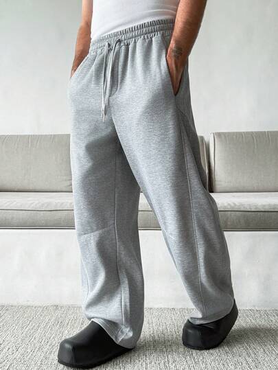 HUEFORM Pantalones de chándal grises de unicolor para hombres, con cordón, ajuste relajado y diseño de hoja curva. La tela forrada térmica proporciona calidez y es perfecta para un estilo de vida relajado y en el hogar. Para el invierno