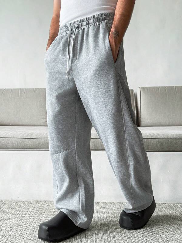 HUEFORM Men's Grey Solid Color Casual Drawstring Relaxed Fit Curved Blade Design Sweatpants, The Thermal Lined Fabric Provides Warmth And Is Perfect For A Relaxed, Home-Based Lifestyle. For Winter