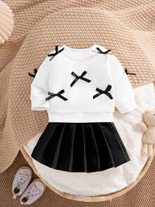 SHEIN Bộ 2 món đồ thường ngày dễ thương cho bé gái sơ sinh, áo nỉ dài tay màu vàng có nơ trang trí hình quả đào kết hợp với chân váy xếp ly màu nâu nhạt, thích hợp mặc hàng ngày, đi học, chụp ảnh, dự tiệc - màu đen - Xem 3