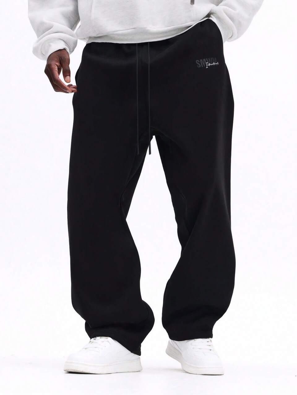 Jogginghose mit tiefem Schritt und gesticktem Logo