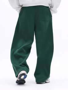 SUMWON Pantalon de jogging ample avec imprimé New York et graphiques sur les côtés des jambes. Style casual et confortable pour l'hiver. - Vert sapin - Voir 3