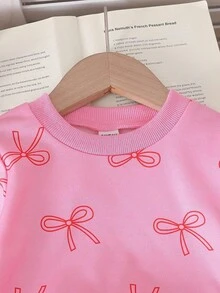 SHEIN Playful Pals Set de 2 piezas: Sudadera con cuello redondo y mangas raglán con estampado de mariposa informal y elegante para niñas, y pantalones vaqueros rectos de cintura elástica holgados, adecuados para primavera, otoño y vuelta al colegio - Rosa - Ver 5