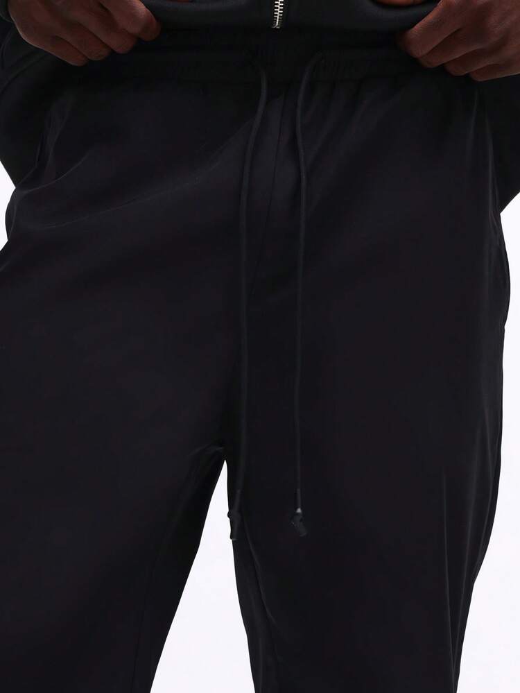 Flare Fit Nylon Pants With Side Pockets