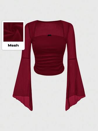 Blouse à manches évasées en maille minimaliste de couleur unie, pour un port quotidien