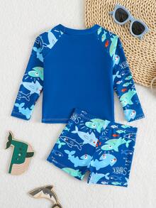 SHEIN 2pcs Baby/Toddler Boys' Swimsuit Set, Cute Cartoon Shark Print Colorblock Long Sleeve Knit Top And Swim Trunks, Separate Swimwear Outfit Boy Swim Set Baby Boy Rash Guard Boy Swimsuit Set Boy Long Sleeve Rash Guard Boy Swimsuit Set Long Sleeve Baby Boy Swim Set Baby Boy Swimsuit Long Sleeve Sea Animal Baby Clothes Beach Wear For Baby Boy Sea Horse Bathing Suit Toddler Baby Boy Shark Swimwear Boy Swimsuit Set Long Sleeve Baby Boy Beach Clothes - Blue - View 3