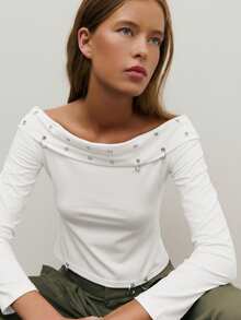 Nöista Off-Shoulder Top With Metal Hardware Detailing, Offering A Bold Alternative-Inspired Design Suitable For Women's Spring Break Outfits Outfits; A Striking Piece That Works For Casual Business Looks, Modern Formal Styling, Elevated Everyday Wear, Festive Birthday Outfits For Women Clothes Dressing And Refined Valentine's Day. - White - View 12