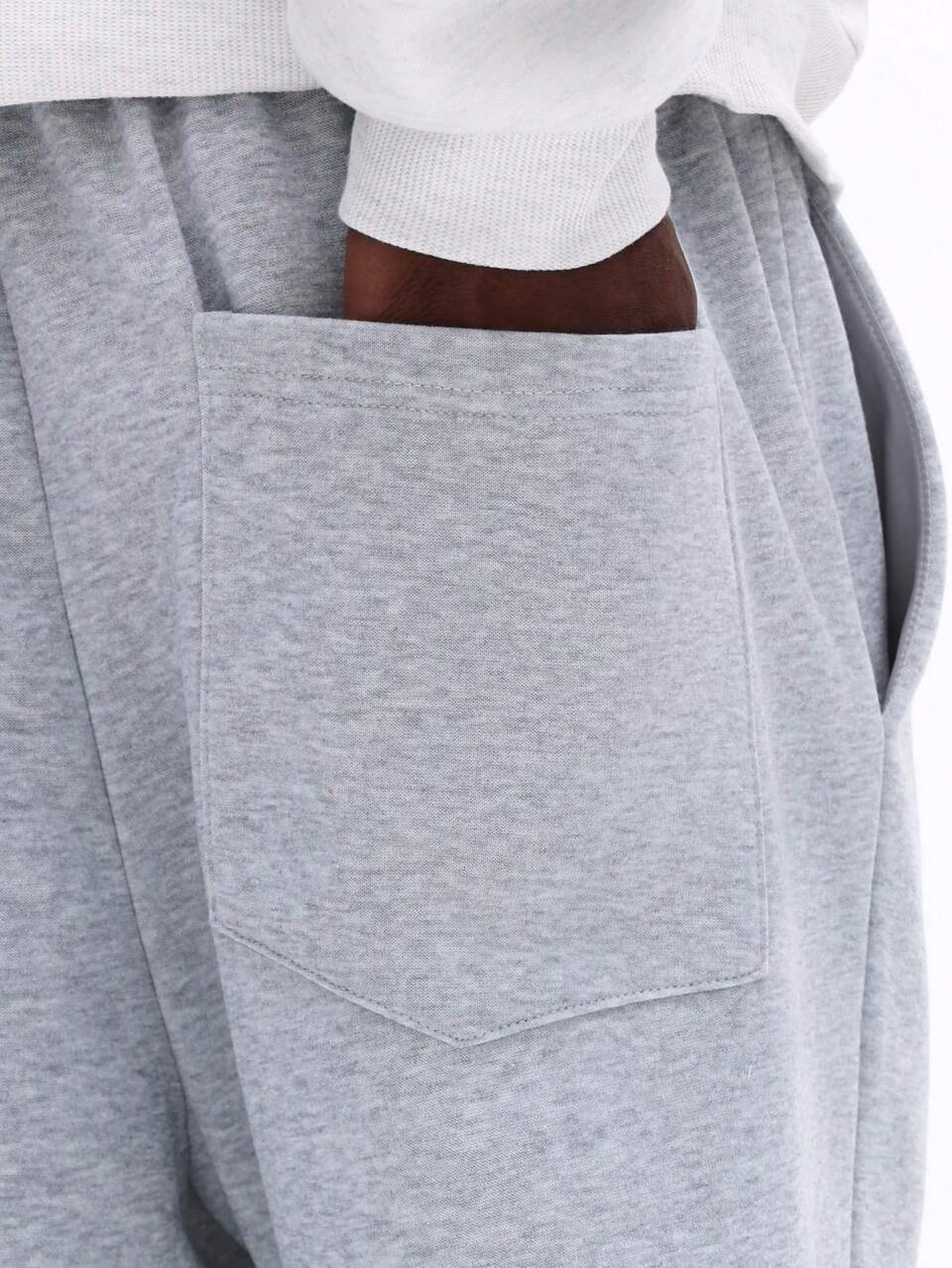 Pantalon de survêtement à jambes évasées avec logo rouge