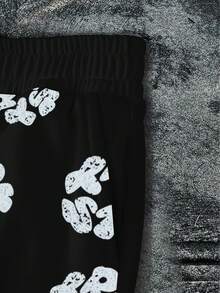 Glimmora Pantalones casuales sueltos con cintura elástica y cordón, estampado total para hombres - Multicolor - Ver 4