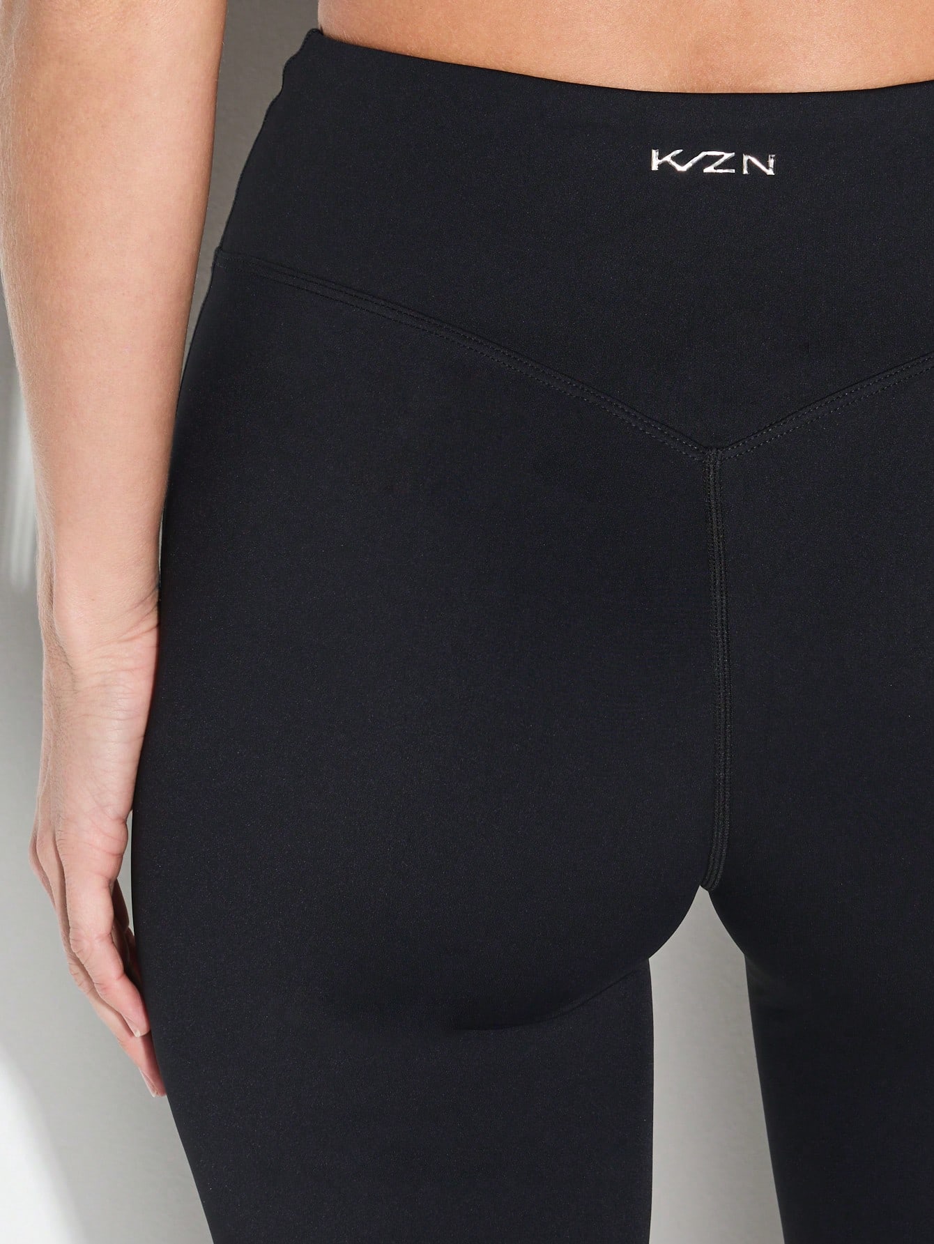 KIZN Calças legging de cintura alta com bolsos laterais