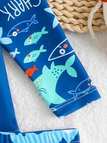 SHEIN 2pcs Baby/Toddler Boys' Swimsuit Set, Cute Cartoon Shark Print Colorblock Long Sleeve Knit Top And Swim Trunks, Separate Swimwear Outfit Boy Swim Set Baby Boy Rash Guard Boy Swimsuit Set Boy Long Sleeve Rash Guard Boy Swimsuit Set Long Sleeve Baby Boy Swim Set Baby Boy Swimsuit Long Sleeve Sea Animal Baby Clothes Beach Wear For Baby Boy Sea Horse Bathing Suit Toddler Baby Boy Shark Swimwear Boy Swimsuit Set Long Sleeve Baby Boy Beach Clothes - Blue - View 6