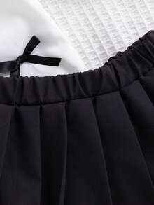 SHEIN Bộ 2 món đồ thường ngày dễ thương cho bé gái sơ sinh, áo nỉ dài tay màu vàng có nơ trang trí hình quả đào kết hợp với chân váy xếp ly màu nâu nhạt, thích hợp mặc hàng ngày, đi học, chụp ảnh, dự tiệc - màu đen - Xem 6