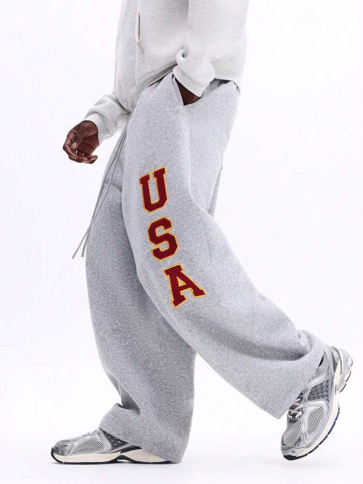 Spodnie dresowe z nadrukiem USA na nogawkach