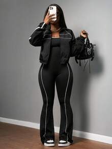 Slaydiva 2025新款初秋休闲简约日常约会运动风瑜伽服小立领速干运动面料前中拉链落肩黑色拼接白色缎带长袖上衣+黑白拼接紧身背心连体裤喇叭裤侧边白色条纹拼接瑜伽裤针织套装女两件套 - A - 黑色 - 查看 4