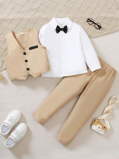 SHEIN Conjunto de 3 piezas para niños pequeños estilo caballero - Camisa blanca, chaleco azul marino, pantalones de cintura elástica azul marino, adecuado para fiesta de cumpleaños, boda, ocasiones formales, Halloween, Navidad, Acción de Gracias, otoño/invierno