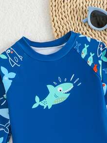 SHEIN 2pcs Baby/Toddler Boys' Swimsuit Set, Cute Cartoon Shark Print Colorblock Long Sleeve Knit Top And Swim Trunks, Separate Swimwear Outfit Boy Swim Set Baby Boy Rash Guard Boy Swimsuit Set Boy Long Sleeve Rash Guard Boy Swimsuit Set Long Sleeve Baby Boy Swim Set Baby Boy Swimsuit Long Sleeve Sea Animal Baby Clothes Beach Wear For Baby Boy Sea Horse Bathing Suit Toddler Baby Boy Shark Swimwear Boy Swimsuit Set Long Sleeve Baby Boy Beach Clothes - Blue - View 5