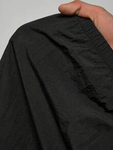 Slaydiva 2025新款初秋休闲简约日常约会运动风瑜伽服小立领速干运动面料前中拉链落肩黑色拼接白色缎带长袖上衣+黑白拼接紧身背心连体裤喇叭裤侧边白色条纹拼接瑜伽裤针织套装女两件套 - A - 黑色 - 查看 7