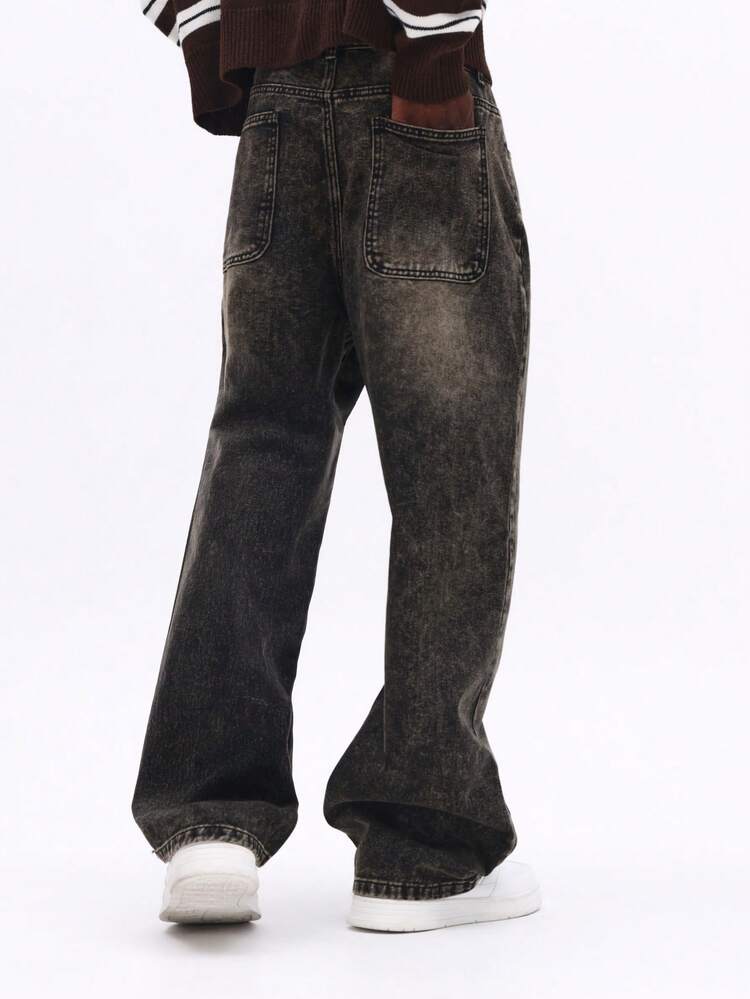 Jeans in denim con lavaggio acido a gamba larga e patta con bottoni