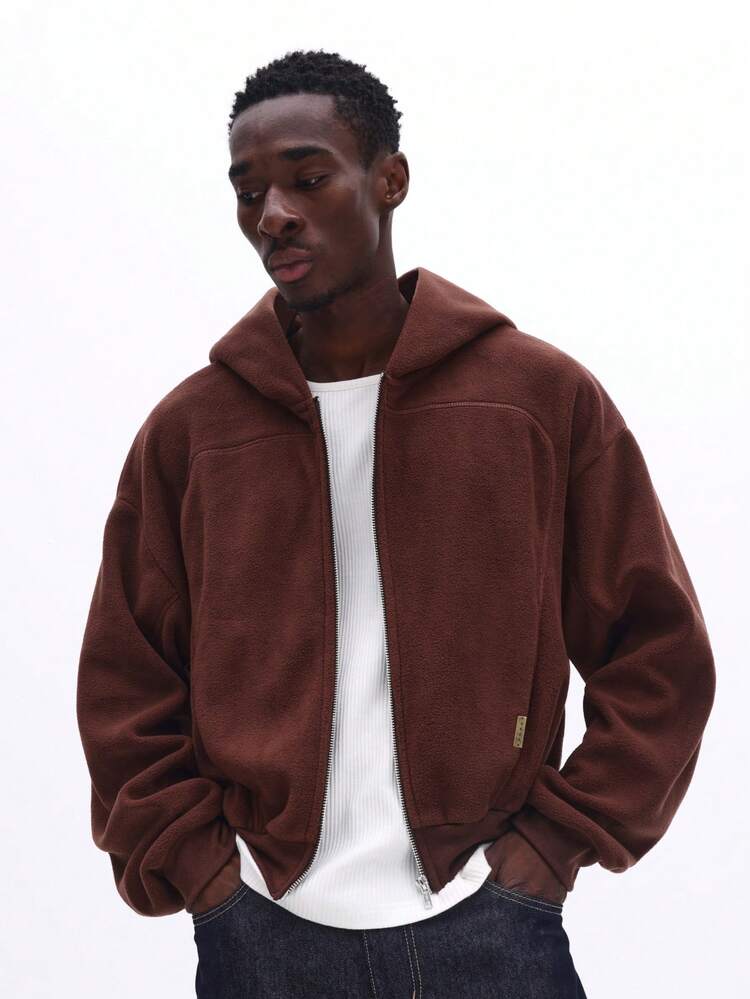 Sweat à capuche zippé en polaire