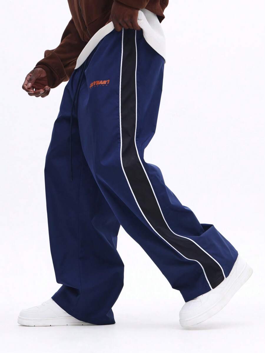 SUMWON Quần thể thao ống rộng bằng vải nylon giản dị có họa tiết sọc tương phản ở hai bên, phù hợp với phong cách đường phố và thể thao thường ngày - Nhiều màu - Xem 1