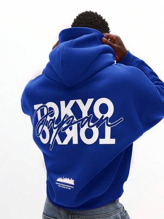 SUMWON Sudadera con capucha con estampado gráfico de texto de Tokio y bolsillo delantero para el invierno