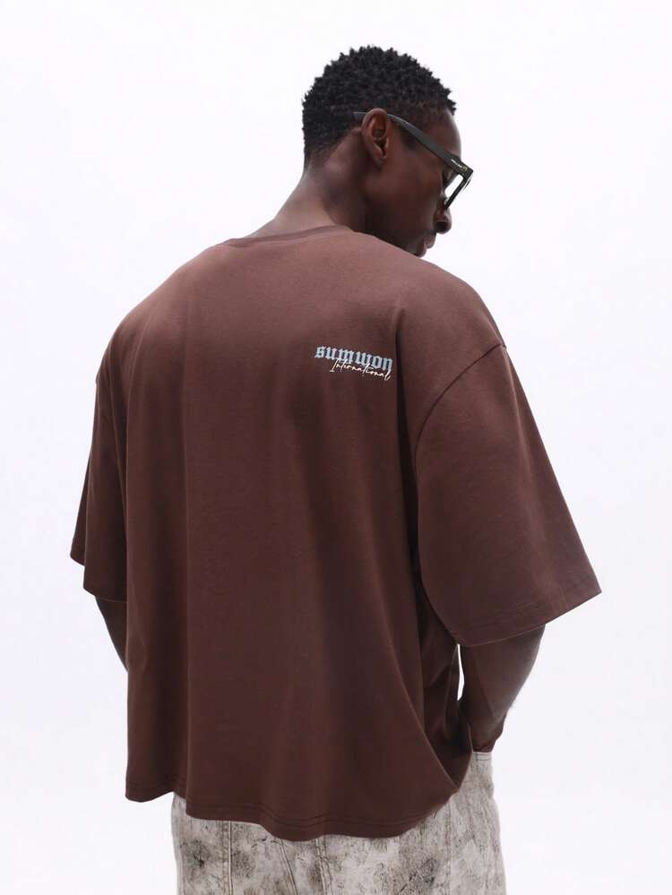 円形ロゴプリントのボックスフィットTシャツ