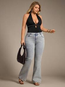 Auralis Jeans ajustados y acampanados de cintura baja y talla grande, color azul - Azul lavado medio - Ver 5