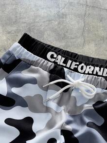 AXEPEAK Pantalones holgados de pierna ancha con estampado de camuflaje, cintura con cordón y bolsillos cargo para hombre - Multicolor - Ver 3