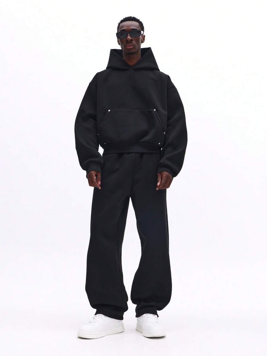 SUMWON Conjunto de chándal con capucha oversize, bolsillo central y pantalones de chándal elásticos para uso casual en invierno - Negro - Ver 1