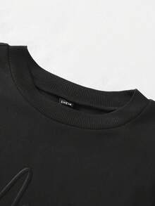 SHEIN LUNE Áo nỉ in chữ "Merry Christmas" dập nổi, màu trơn, cổ tròn, tay dài, thích hợp cho lễ tốt nghiệp, tựu trường, giáo viên, quà tặng gia đình mùa thu/đông, áo nỉ dễ thương cho mẹ, áo nỉ thoải mái cho mẹ - màu đen - Xem 6