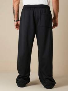 Manfinity Roghcode Plus Size Men's Solid Color Drawstring Waist Pockets Wide Leg Casual Sweatpants Men Loose Fit Pants Men Oversized Pants Men Wide Leg Pants - Black - View 2