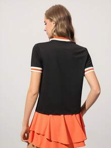 CourtClass Polo de golf décontracté à manches courtes avec col color block et demi-zip pour femmes, hauts de golf d'été pour femmes - Noir - Voir 2