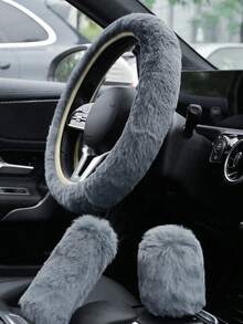 一套汽车方向盘套、换挡杆套和手刹套，冬季保暖绒面材质，弹性贴合，通用型汽车内饰配件