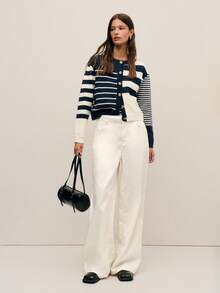 Nöista Wide-Leg Pants In A Soft Tone, Offering A Clean, Elegant Look. Perfect For Spring Break Outfits Outfits, Easy To Style With Sweaters Or Jackets, And Versatile For Both Casual And Formal Occasions. - White - View 3