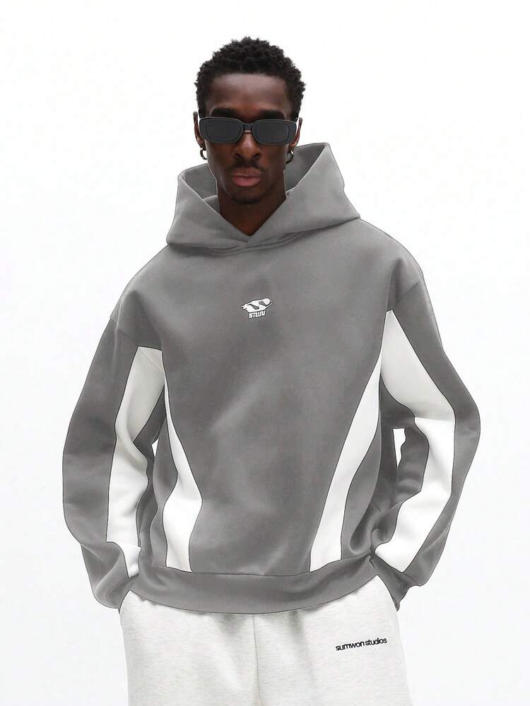 Sudadera con capucha y cordón en bloques de color