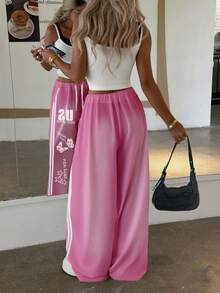 Rovax 女士舒适秋冬运动裤，高品质设计，适合户外、运动、休闲穿着、旅行、度假，字母和祝福印花喇叭裤 - 彩色 - 查看 2