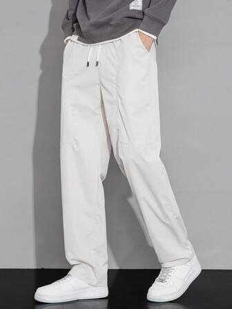 Manfinity Hypemode Pantalones casuales rectos con cintura con cordón y bolsillos para hombres de unicolor