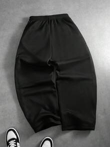 PAVTROS Pantalones deportivos de hombre de unicolor con cintura elástica suelta, cordón y bolsillos - Negro - Ver 2