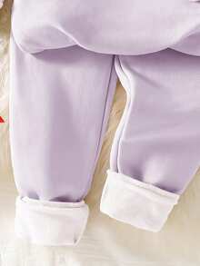 Conjunto de pijama infantil feminino com estampa de unicórnio em fleece grosso, gola redonda, manga comprida e calça.