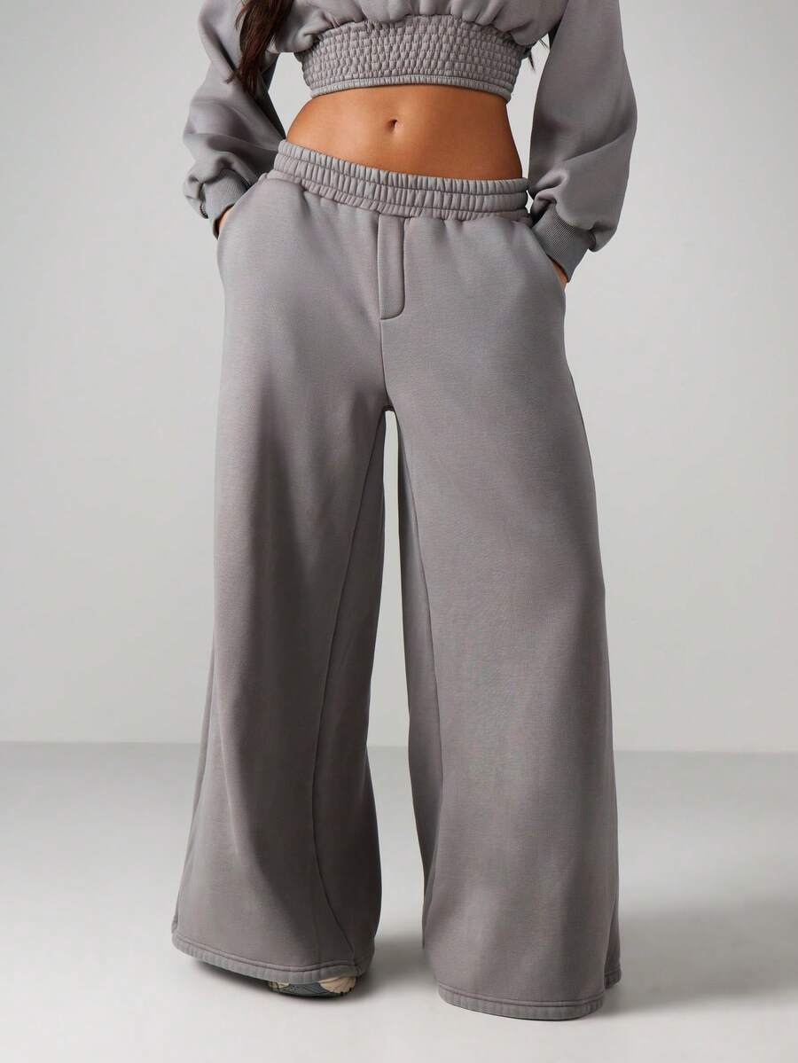 MISSGUIDED Pantalones de chándal holgados y lavados con pernera ancha, con cintura elástica y bolsillos laterales para uso casual en casa - Gris Oscuro - Ver 1